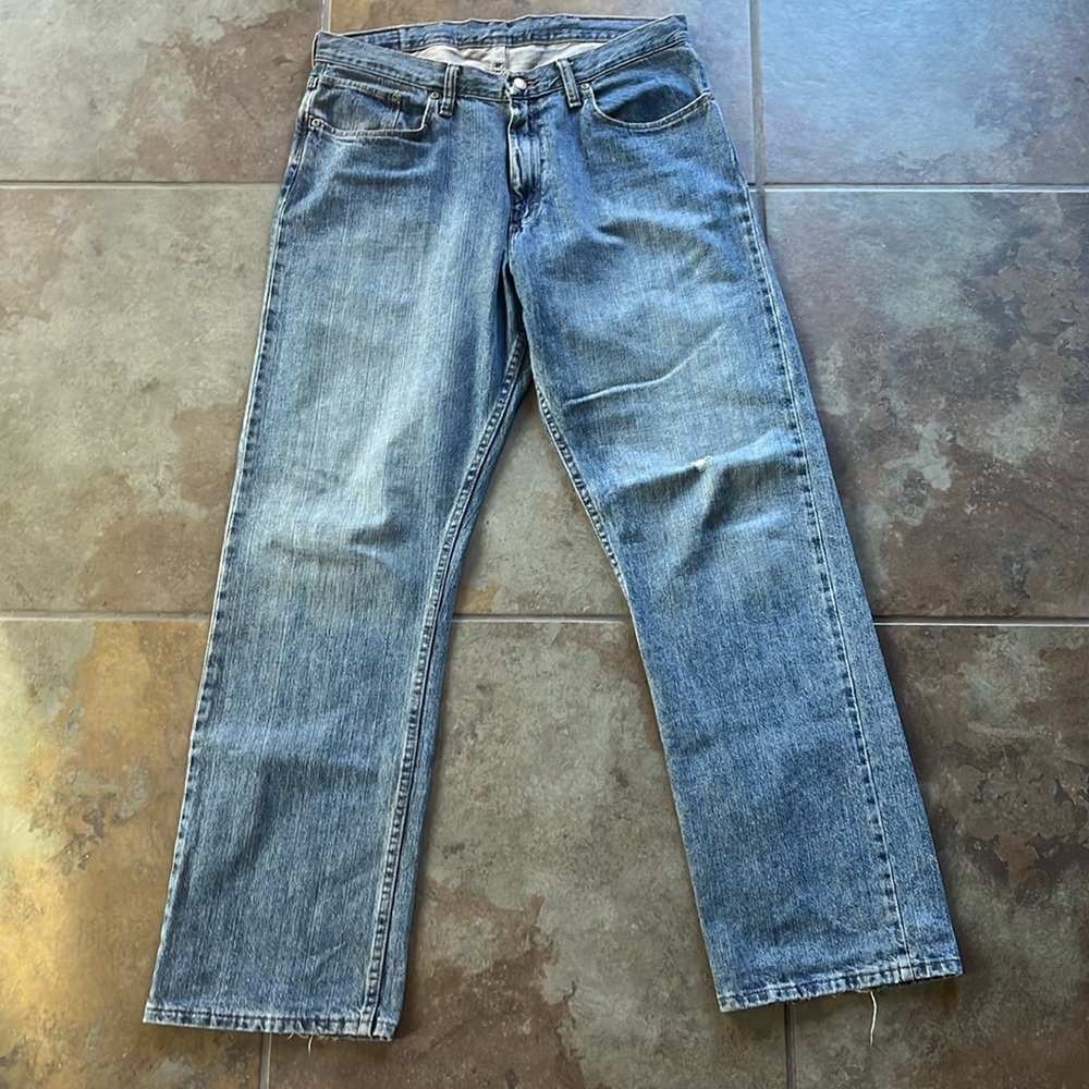 Distressed custom drawstring, wide leg, wranglers, good condition signs of wear